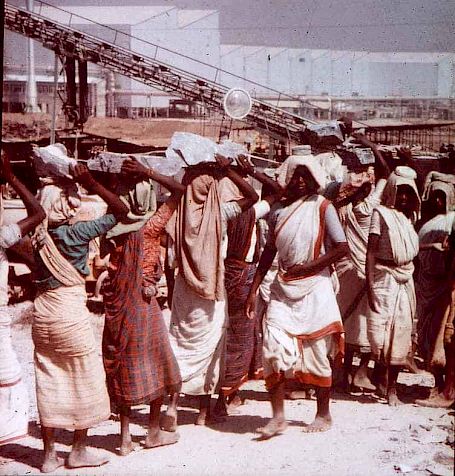 Women workers tending to a steel plant in independent India